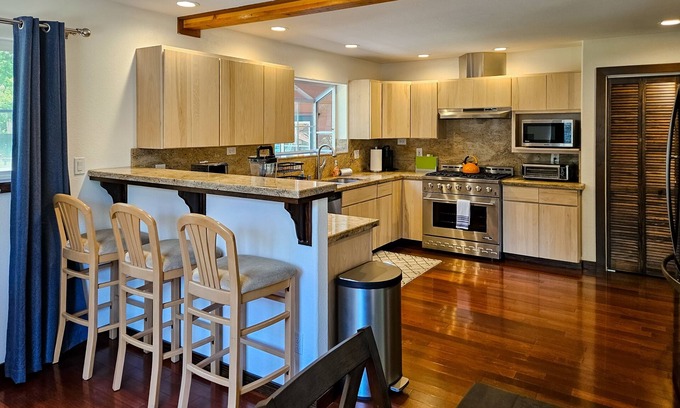 Cleone House | Magical estate & detached guest suite with hot tub, game room, pond & playset