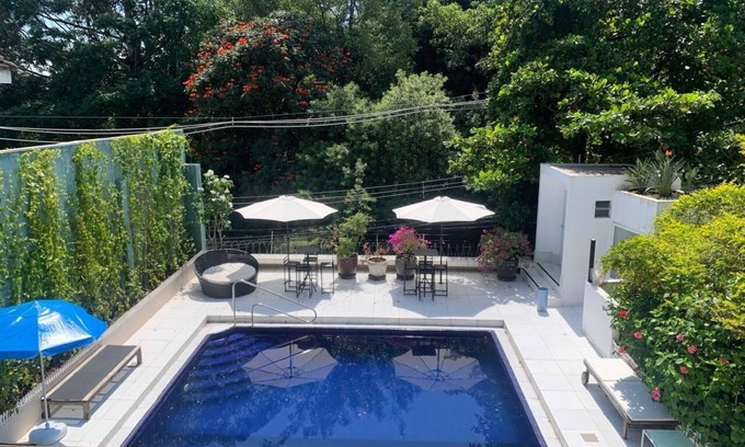Morumbi House | Magnificent suspended pool in Morumbi overlooking the Atlantic Forest