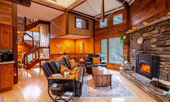 Hancock House | Maple Castle – Cozy Riverside Retreat with Hot Tub, Trails & Fireplace