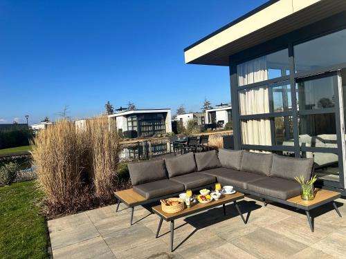 Olburgen House | Marina Strandbad Chalet Refugium mit Zaun Haus Nr 95