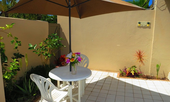 Frydendal Villa | Master Garden Bedroom adjacent to Margaritaville. 50m To The Beach