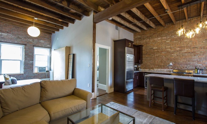 Cleveland Circle Condo | Modern 2-bedroom loft condo near BC, BU, hospitals & train w/parking available.