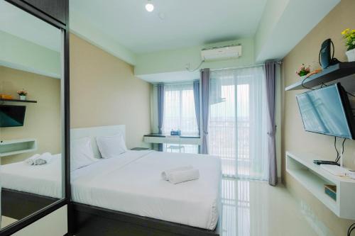 Bekasi Timur Apartment | Modern and Comfy Studio Apartment Grand Dhika City By Travelio