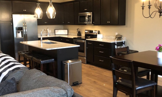 Arnolds Park Condo | Modern clean 2BR/2BA condo with patio & grill, in the heart of Okoboji, IA.