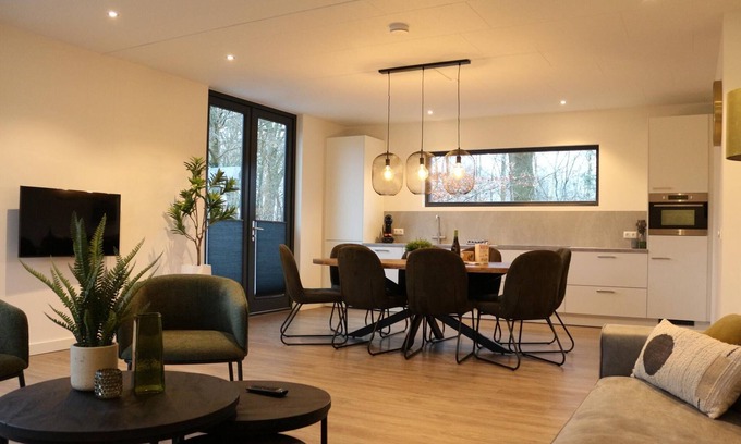 Maasbree House | Modern forest retreat with 4 bedrooms and 3 bathrooms – ideal for family holidays or group getaways in North Limburg nature.