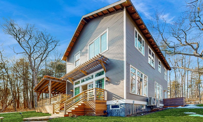 Charlotte House | Modern lakehouse w/private beach, dock, fireplace, gym, theater, jacuzzi tub