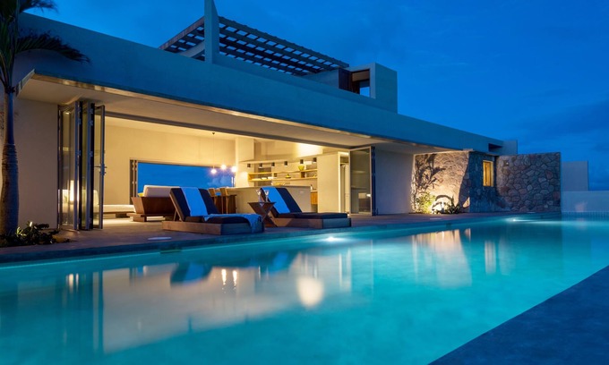 Micoud Villa | Modern Oceanfront Home with Pool, Outdoor Showers and Private Tennis Court