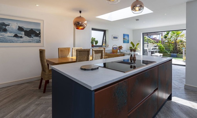 Bude House | Modern rear extension with open plan living and brand new backyard sauna.