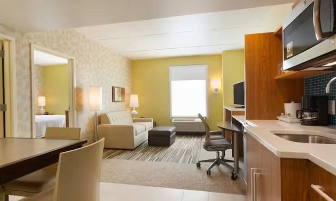 Newtonville Hotel | Modern Retreat: Pets Allowed, Onsite Pool. Close to Six Mile Waterworks!