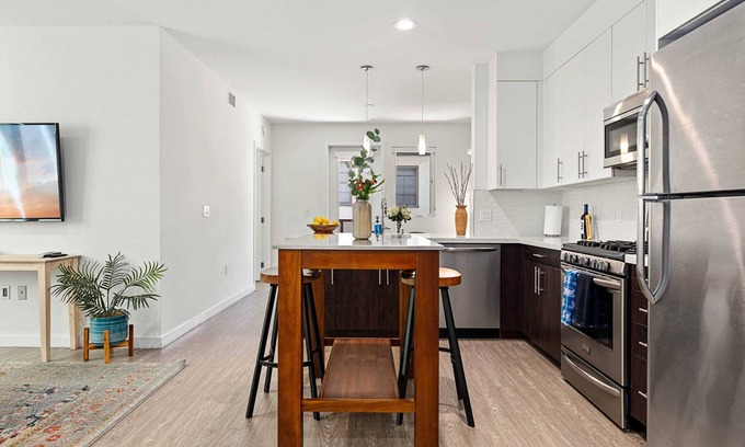 Carthay Circle Condo | Modern Urban Retreat with Industrial Flair