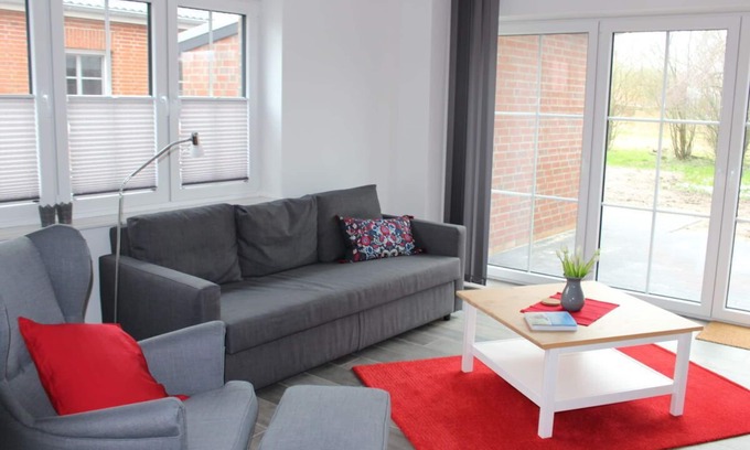 Norden Apartment | Moderne Ferienwohnung Zum Stall für 4 Personen + Hund