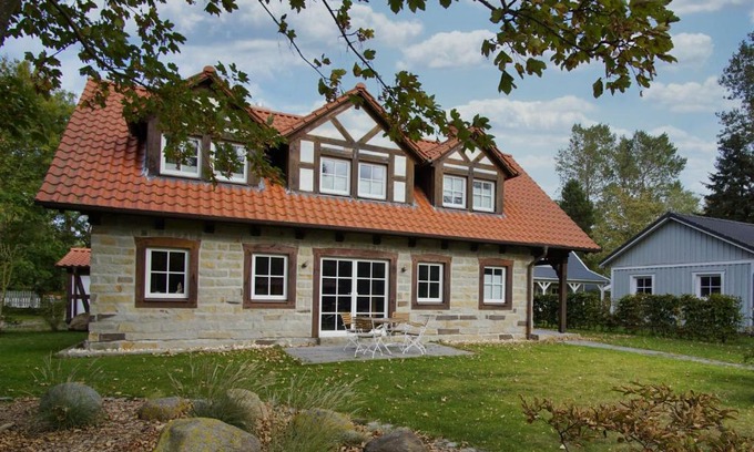 Wiek Apartment | moderne Ferienwohnung mit Kamin, Sauna, Terrasse - Ferienhaus Stenhuus FeWo 01