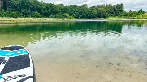 Wiefelstede Apartment | Modernes Haus am See, Ferienhaus Gavner im Seepark Lehe