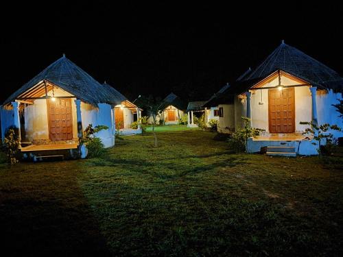 Modhera Resort | MODHERA SUNRISE RESORT - Tents Bhungas Jungle Restaurants & Candlelight Dining