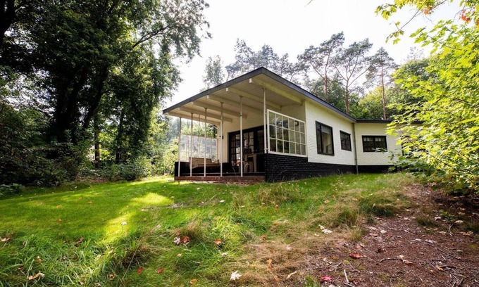 Norg House | Monumental 2-person bungalow, built under the architecture of the Amsterdam School with special details.