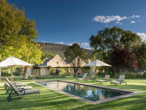 Blue Crane Route Cabin | Mount Camdeboo Private Game Reserve by NEWMARK