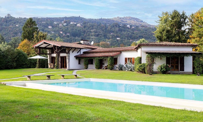 Solcio Villa | My Rental Homes - Villa Brin with tennis court, private sandy beach and dock