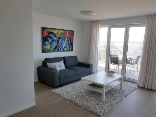 Bosau Apartment | Neubau-Ferienwohnung mit Panorama-Seeblick