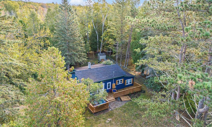 Northern Lower Peninsula House | NEW 2025: Wooded Retreat across from Lake MI