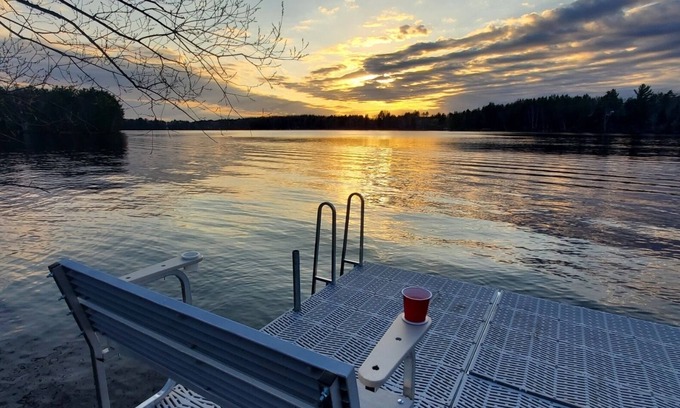 Phillips Cabin | New cabin with lake-facing windows on 400-acre Long Lake of the Phillips Chain.