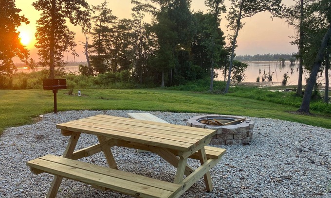 Southport Cottage | New Lake Front Studio Style Cottage - w/private dock, kayaks and full kitchen