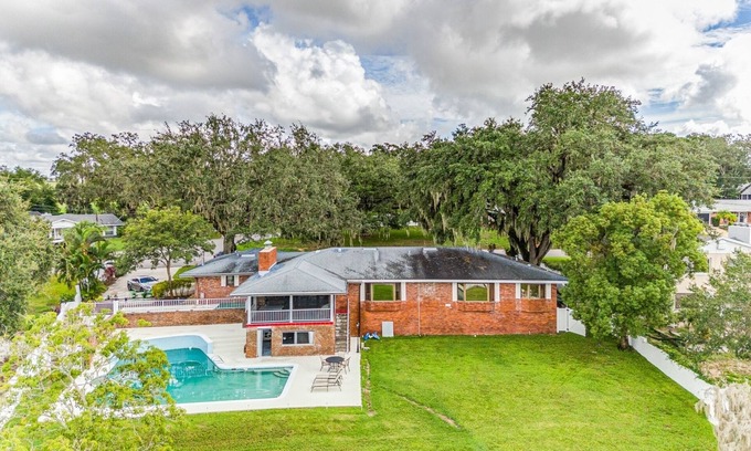 Haines City House | NEW LISTING! Beautiful Lake View Retreat Drivable to Theme Parks