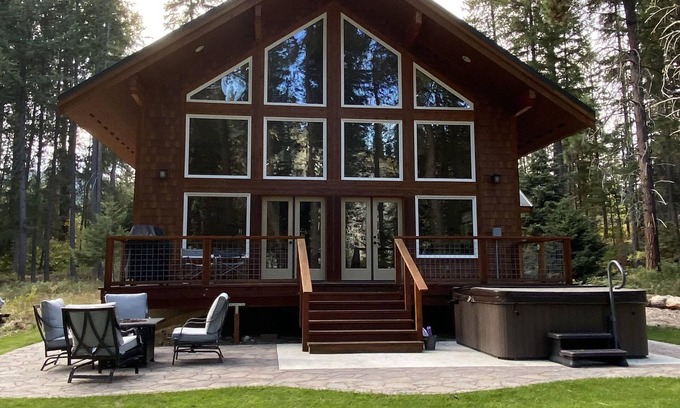 Plain House | Newly built Riverfront cabin with a hot tub and fireplace, sleeps 6 guests.