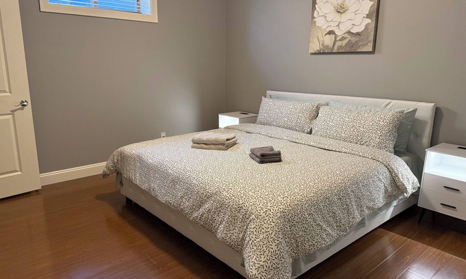 Arbutus Ridge House | Newly furnished King-bed Room1, shared bath and common space