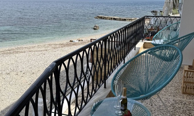 Benitses Apartment | Newly renovated luxury apartment on the beach with large sea front patio