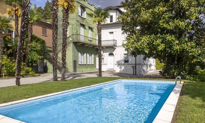 Meina Apartment | Nice apartment for 4 guests with pool, A/C, TV and parking
