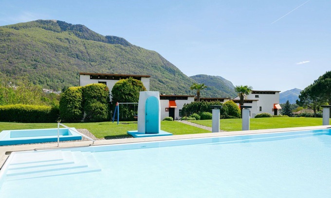 Capriasca Apartment | Nice apartment for 5 guests with pool, WIFI, TV, patio, pets allowed, panoramic view and parking