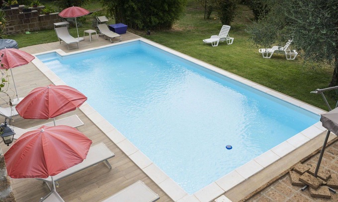 Corchiano Apartment | Nice apartment for 8 guests with WIFI, pool, TV, patio, pets allowed and parking