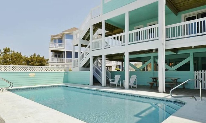 Buck Island House | Ocean-side home with heated pool, hot tub & elevator