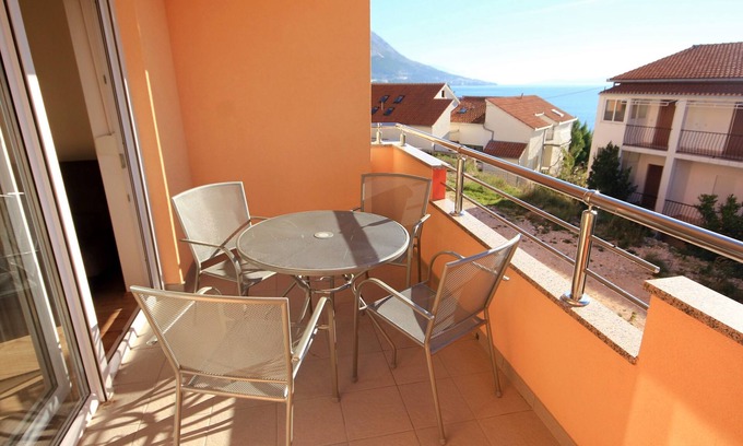 Duce Apartment | One bedroom apartment with terrace and sea view Duće, Omiš (A-9437-c)