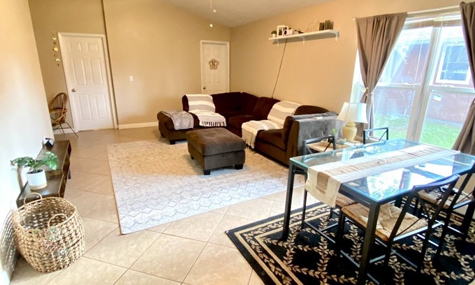 Poinciana House | One bedroom with designated parking space at Kissimmee