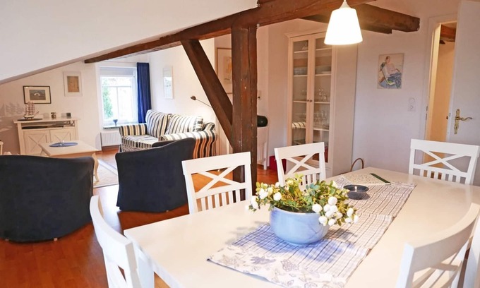 Kopperby Apartment | Only 400m from the Schlei, our cozy vacation apartment "Schleimuschel" is located on the 1st floor of a charming two-family house with tasteful furnishings and a garden for a great vacation feeling