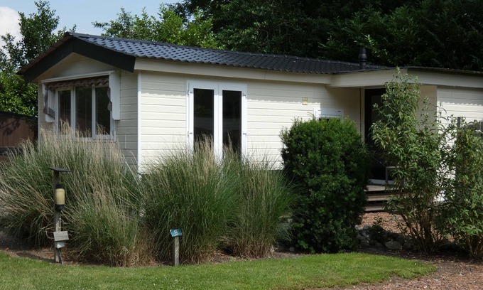 Marum Ski Chalet | Op de grens van Friesland,Groningen en Drenthe,direct tegen bos gelegen