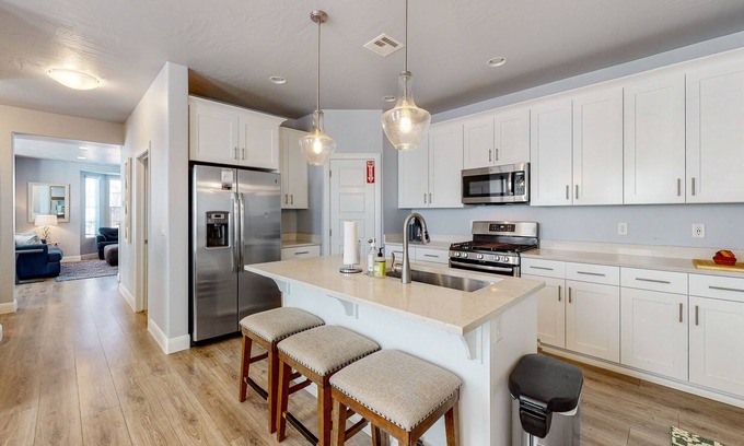 Sienna Hills House | Open-concept townhome with grill, pool, tennis court, & central AC