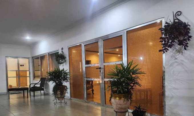 Kumasi Cabin | Our family-friendly home is centrally located and our arms open to welcome you