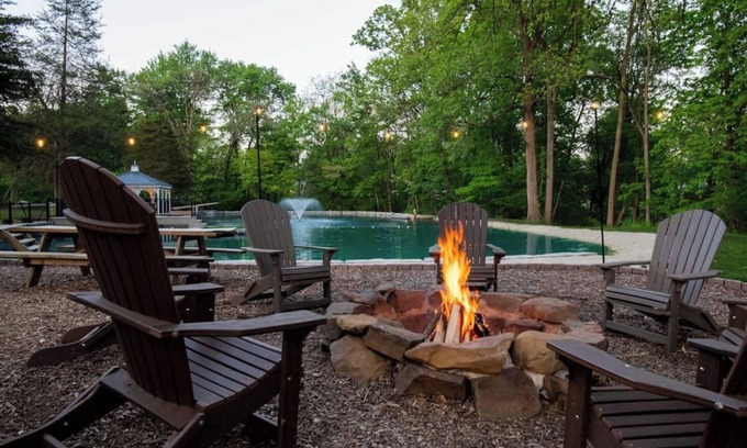 Honey Brook House | Outdoor Oasis with pickleball, swimming pond, basketball, shuffleboard & pavilion with kitchen