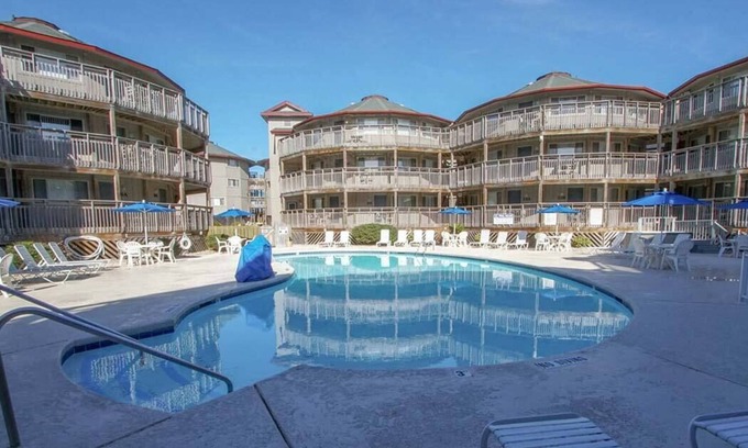 Kill Devil Hills Resort | Outer Banks Beach Club charming oceanside resort with private beach and pools