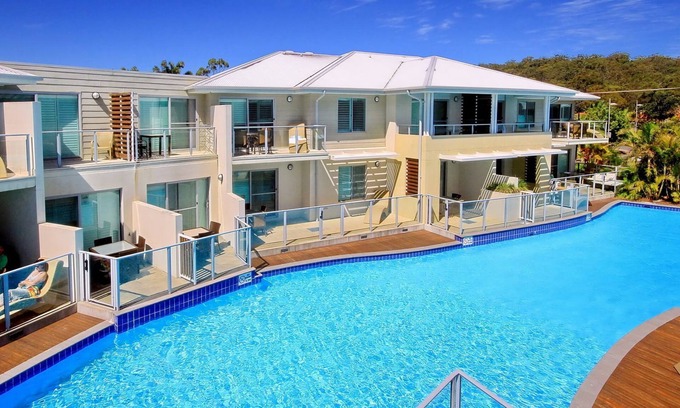 Salamander Bay Apartment | Overlooking the lagoon pool and with access to all the resort facilities
