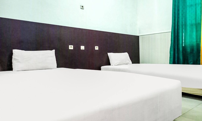 Sei Pinang Hotel | OYO 91936 Hotel Lima Dara