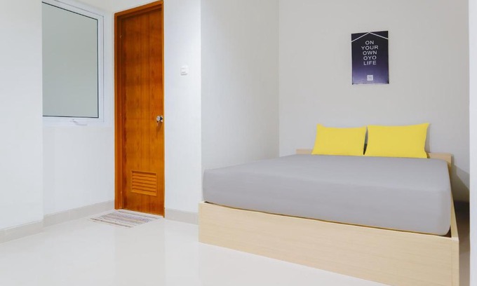 Tomang Hotel | OYO Life 1830 Mandala Residence