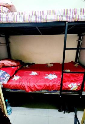 Al Muraqqabat Apartment | Partition Men bed Space