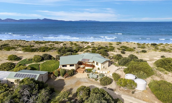 Dolphin Sands House | Peace & Plenty - beachfront hideaway with an indoor heated pool