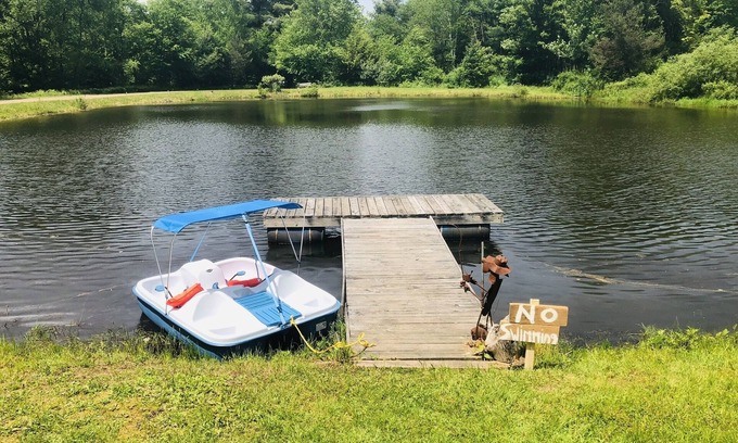 Walton House | Peaceful Cabin with Hot Tub, Game Room & Pond View
