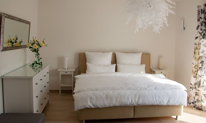 Waschenbeuren Apartment | Penthouse with roof terrace and an unobstructed view of the Hohenstaufen.