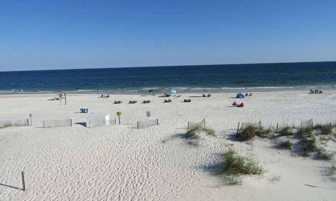Ono Island Condo | PERFECT LOCATION FOR UNCROWED BEACH LOVERS! HEATED POOL. 50 STEPS TO THE BEACH!