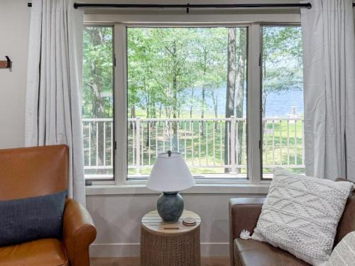 Iron River House | Pet-Friendly Lakefront Cabin by arc Vacation Rentals
